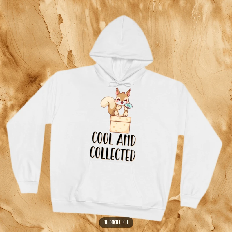 Comfortable hoodie with a happy squirrel perched on a gift box, holding a tiny fan, perfect for cozy days.