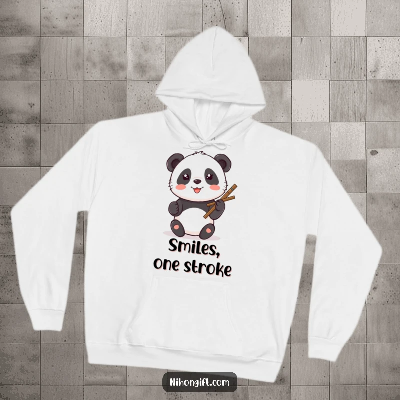 Funny Kawaii Panda Hoodie depicting a panda painting a smiley face with artistic flair.