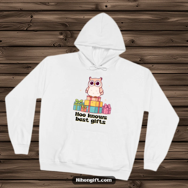 Funny kawaii owl nestled on a stack of gifts, radiating warmth and cuteness on a comfortable hoodie.