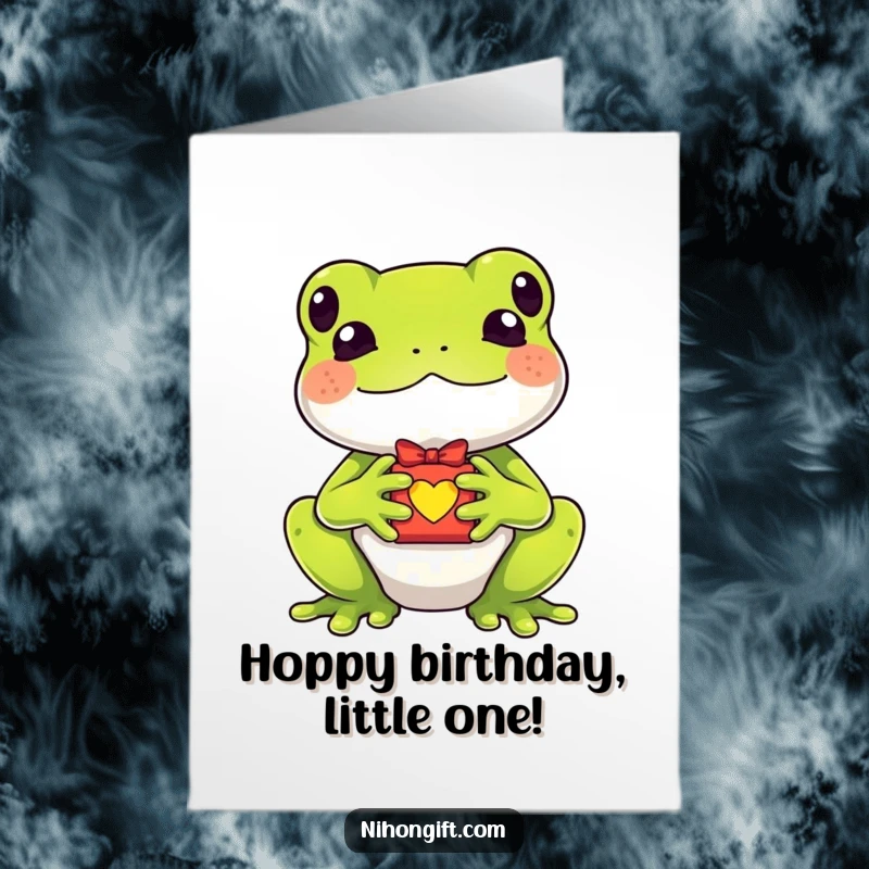 Funny Free Printable Birthday Card: A kawaii frog happily clutching a tiny lucky charm gift, bestowing good wishes.