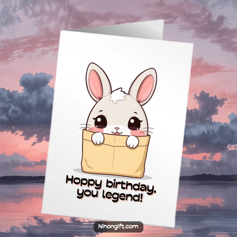 Funny Free Printable Birthday Card: A cute bunny with wide, curious eyes peering intently into a plain paper bag.