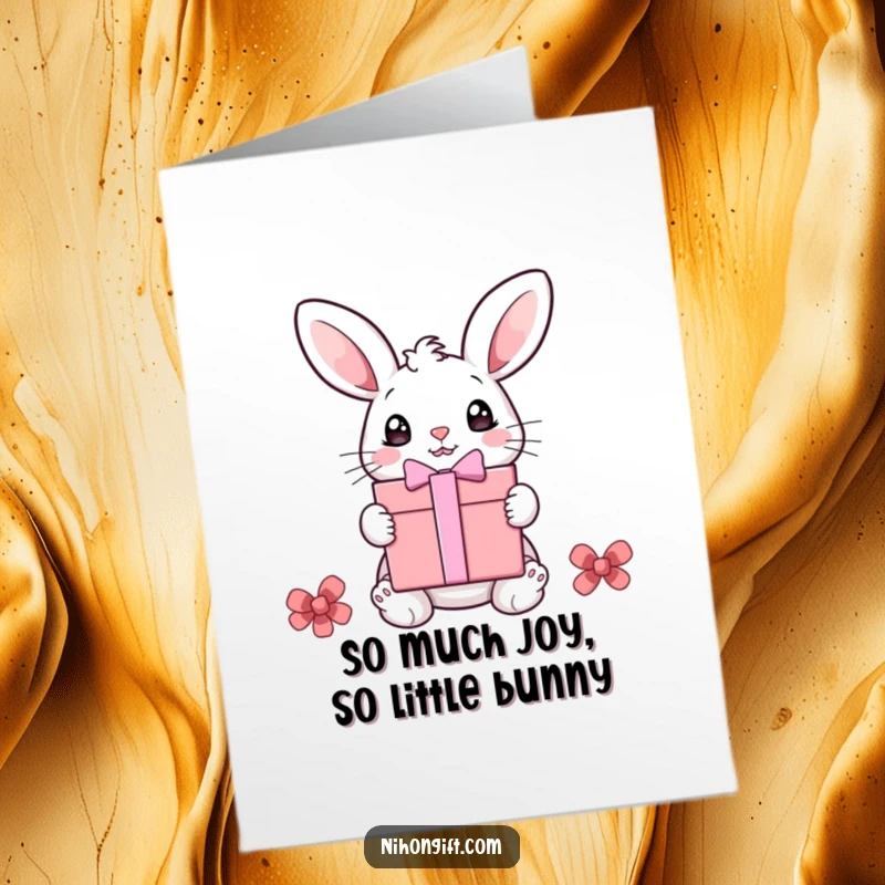 Funny Free Printable Birthday Card: Cute bunny with huge eyes stares at a giant gift box, pure excitement.