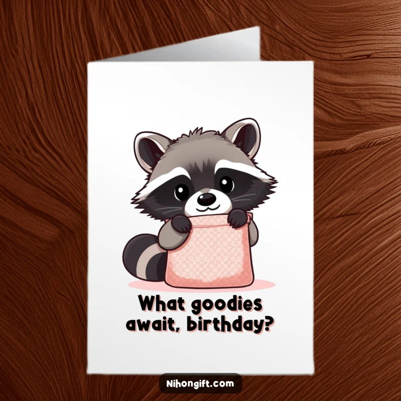 Funny free printable birthday card: Kawaii raccoon peering with curiosity into a sparkling, mysterious gift bag, ready for birthday fun.