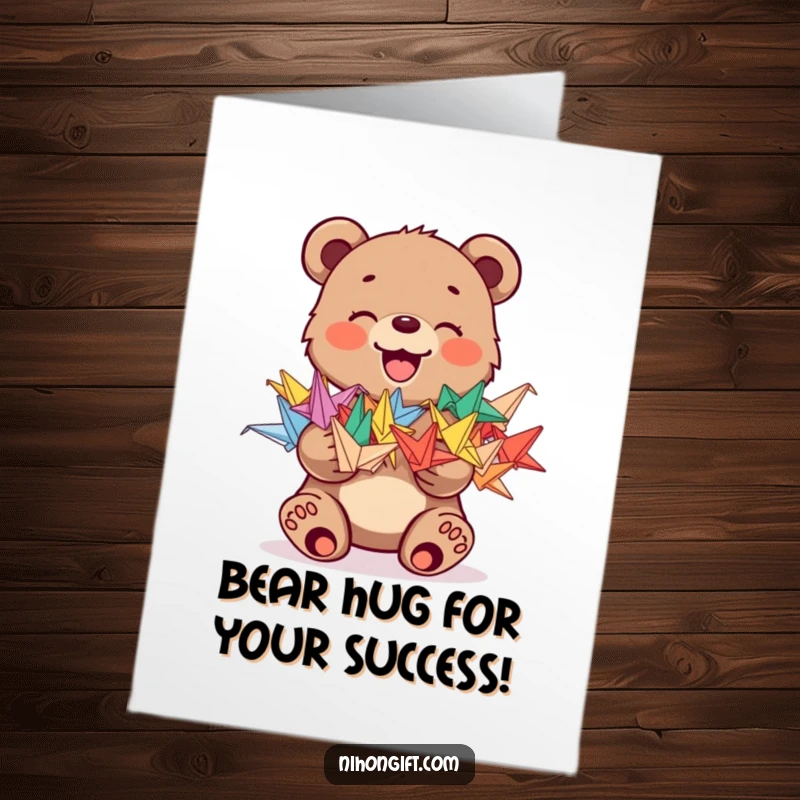 Funny Free Printable Bear Congratulations Card: Joyful bear cub holding colorful origami cranes, wishing success and good fortune.