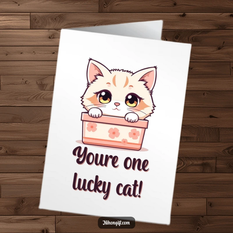 Funny Free Printable Cat Congratulations Card: A curious cat emerges from a Japanese gift box, celebrating achievements with wide-eyed wonder.