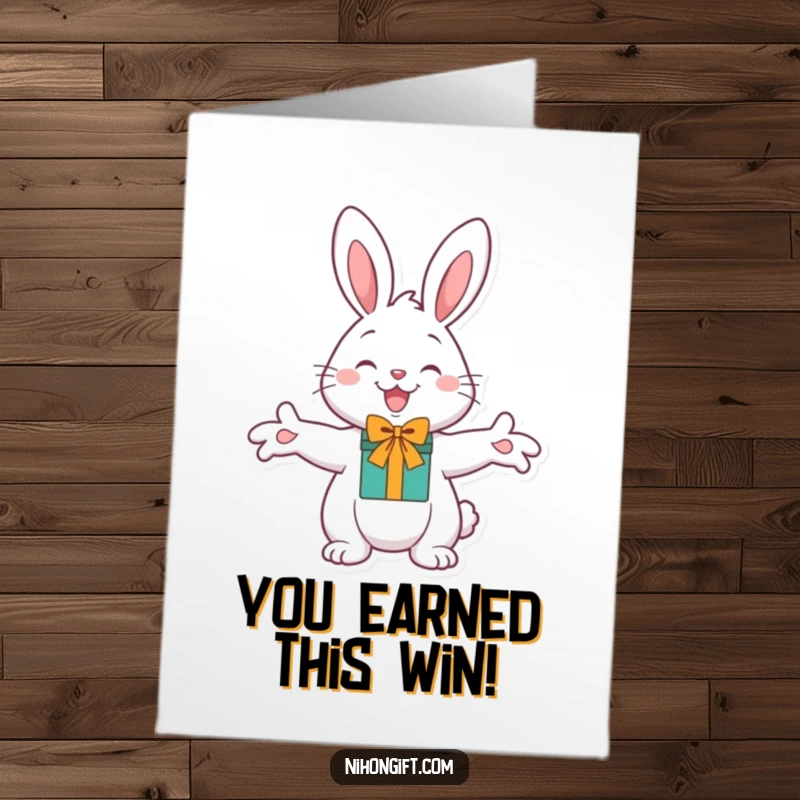 Funny Free Printable Congratulations Card: A cheerful bunny happily offers a gift with outstretched paws.