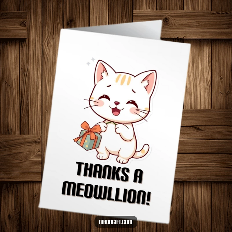 Funny Free Printable Thank You Card: A smiling cat gleefully dangles a piece of string from a nicely wrapped gift box.