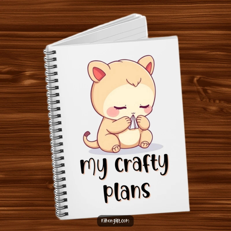 Funny notebook showcasing a bowing creature holding a delicate paper crane, ideal for artistic journaling.