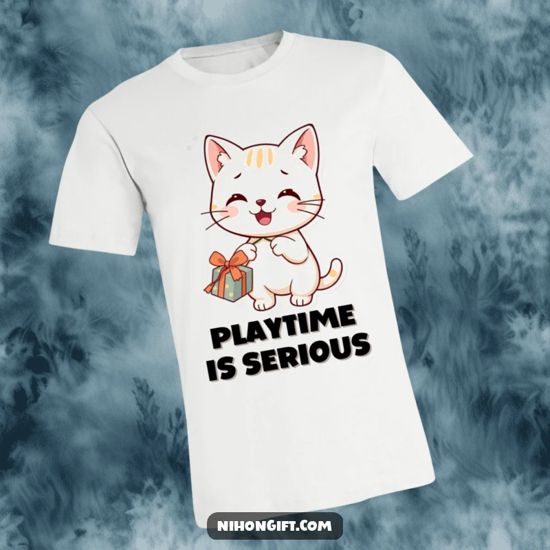 Funny smiling cat in a t-shirt, happily dangling a string from a gift, embodying playful mischief.