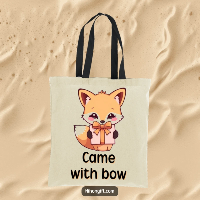 Funny tote bag showcasing a cute fox holding a decorative gift box, ideal for shopping and gifts.
