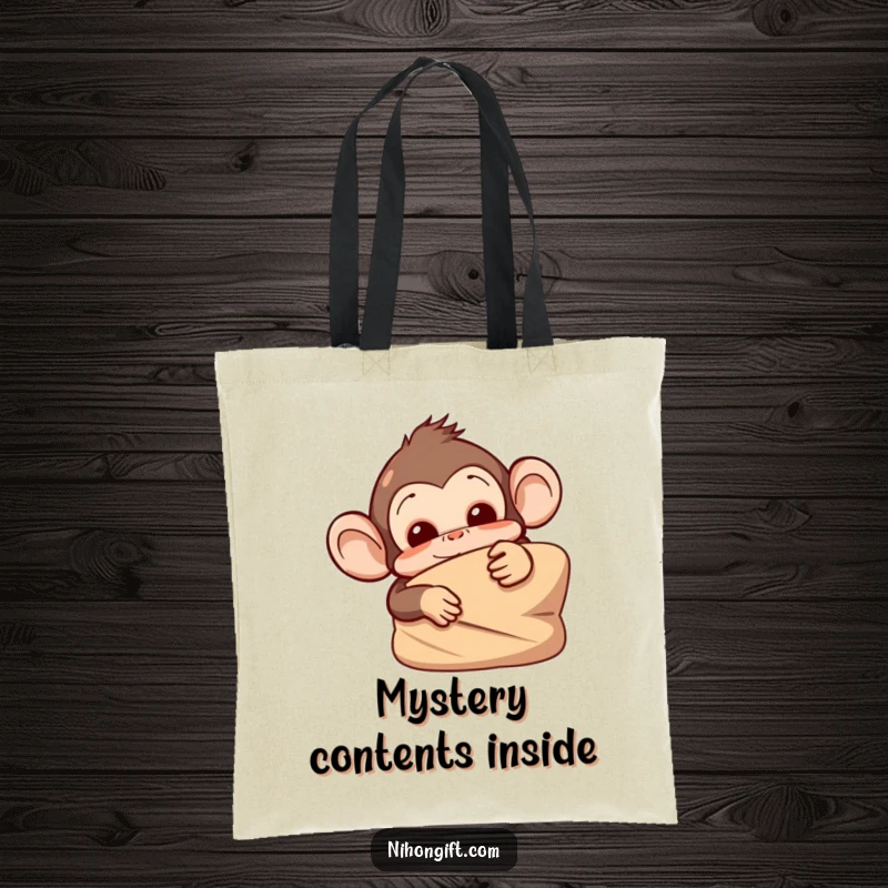 Funny monkey tote bag showing a mischievous monkey peeking from behind a wrapped item, great for carrying essentials.