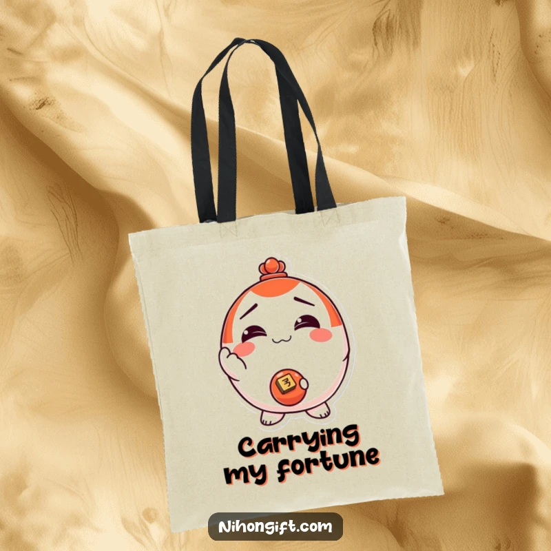 Funny! Daruma doll tote bag with a smiling face, holding out a shiny coin, great for carrying items with luck and humor.