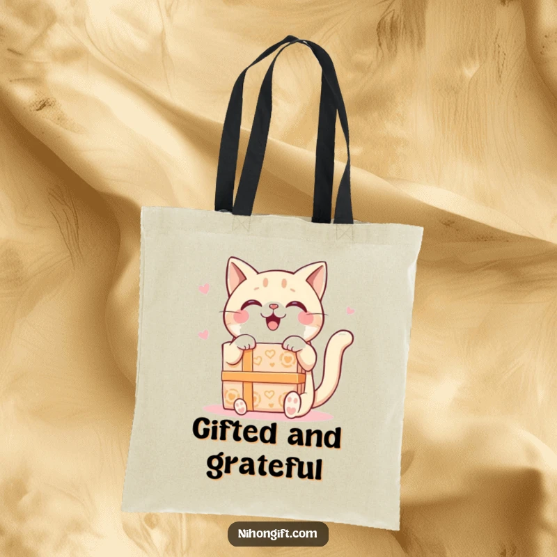 Funny Kawaii Cat Tote Bag depicting a delighted cat receiving a large, ornate gift box, perfect for carrying joy and essentials.