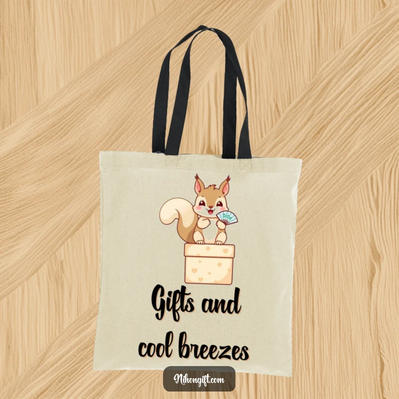 Funny squirrel tote bag showcasing a happy squirrel on a gift box holding a fan, great for carrying essentials.