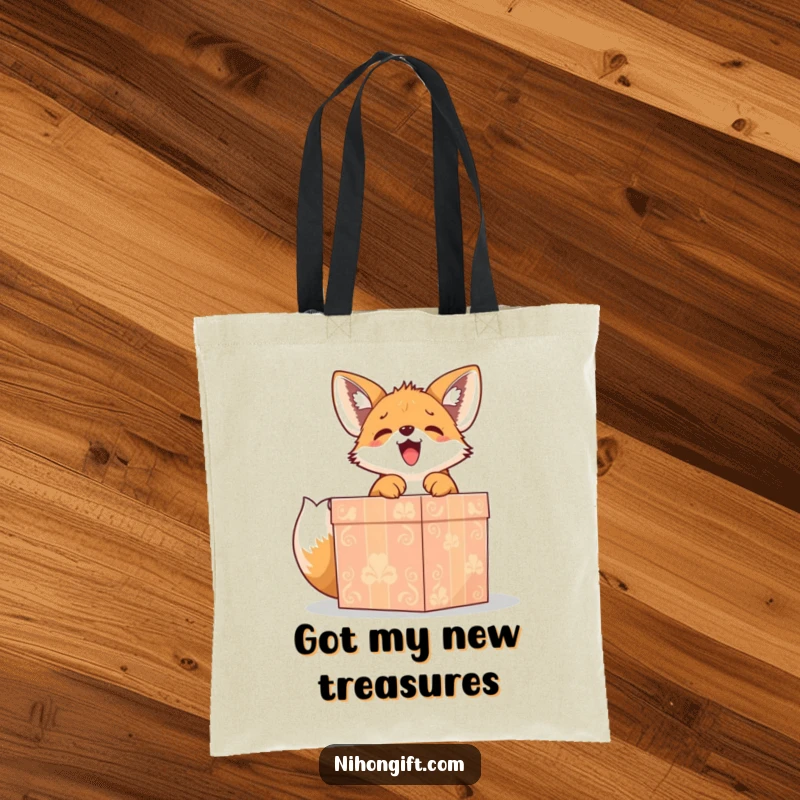 Funny cute fox puppy gleefully unwrapping a large, ornate gift box on a tote bag, a humorous and practical accessory.